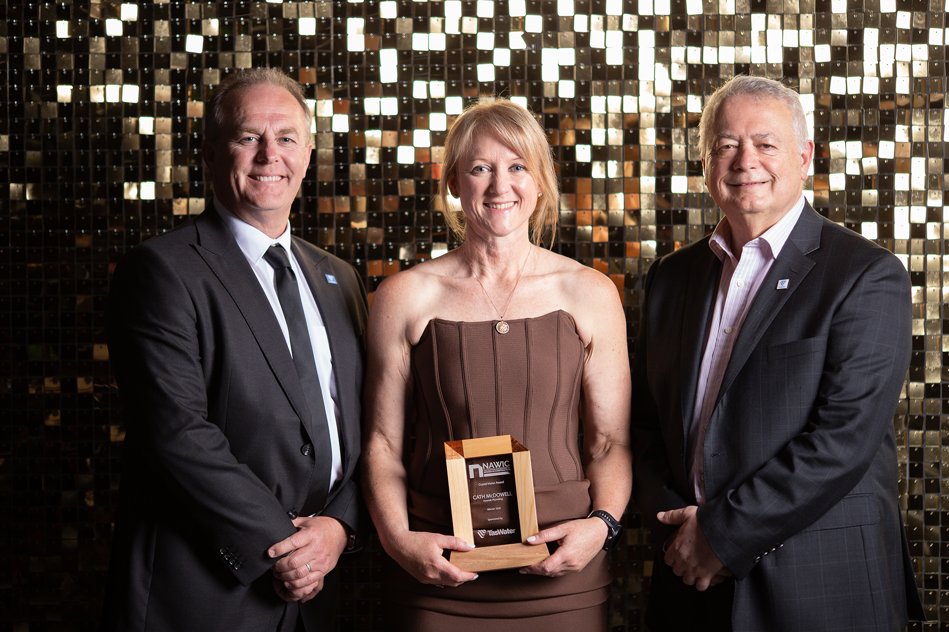 Managing director at Howrah Plumbing, Cath McDowell, celebrates her Crystal Vision Award from the National Association of Women in Construction